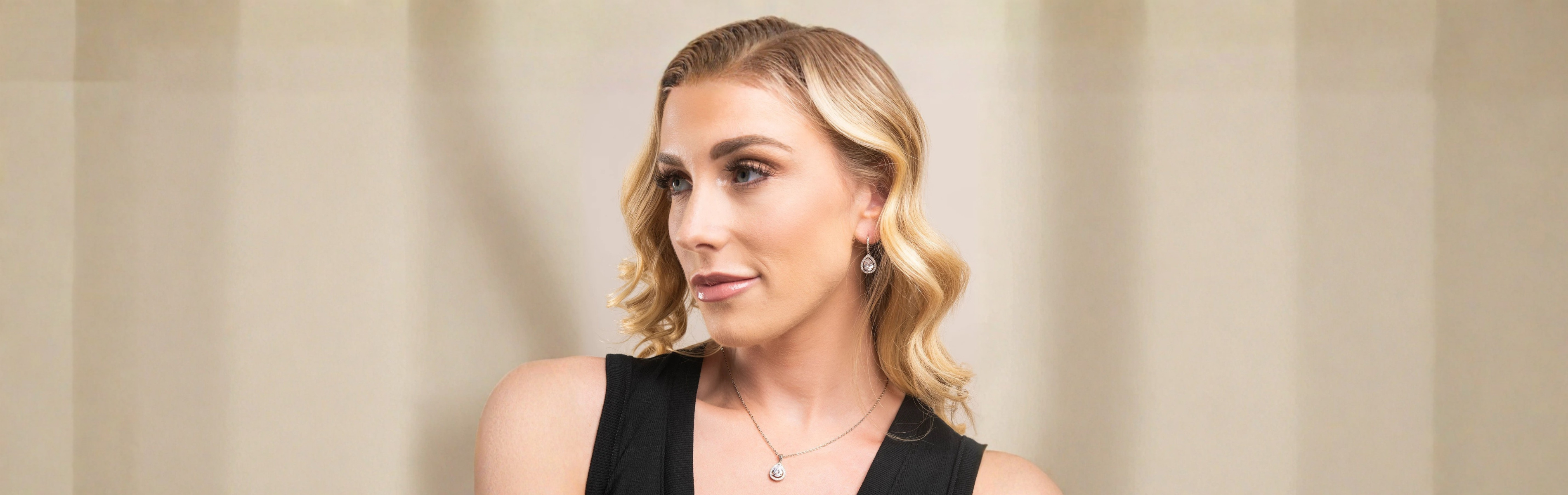 Cate & Chloe Bianca earrings sparkling with crystal accents, perfect glam for everyday elegance and special moments